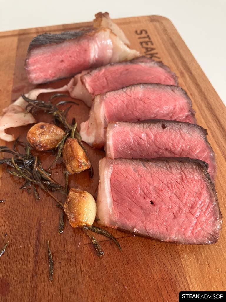 A 2-inch (5 cm) thick steak cooked and sliced