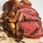 A 2-inch (5 cm) thick steak cooked to perfect medium-rare doneness with a nice crust on the outside.