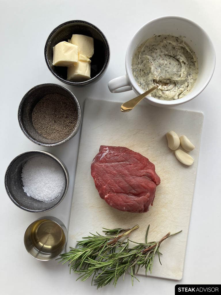 Ingredients: finely ground black pepper, kosher salt, compound butter, butter, garlic cloves, fresh rosemary, refined avocado oil and steak.