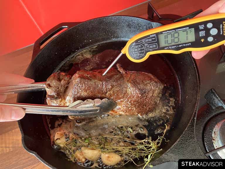 Perfectly seared steak ready for takeoff from the skillet