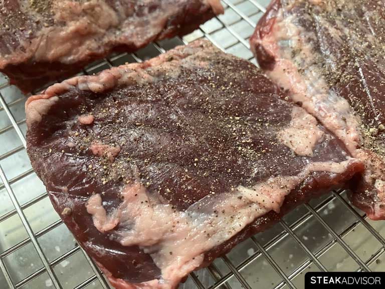 skirt steak seasoned with finely ground black pepper