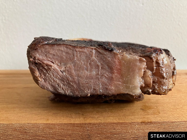 Steak cooked to well-done doneness at 165°F or 74°C