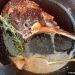 baste the cowboy steak with the melted butter