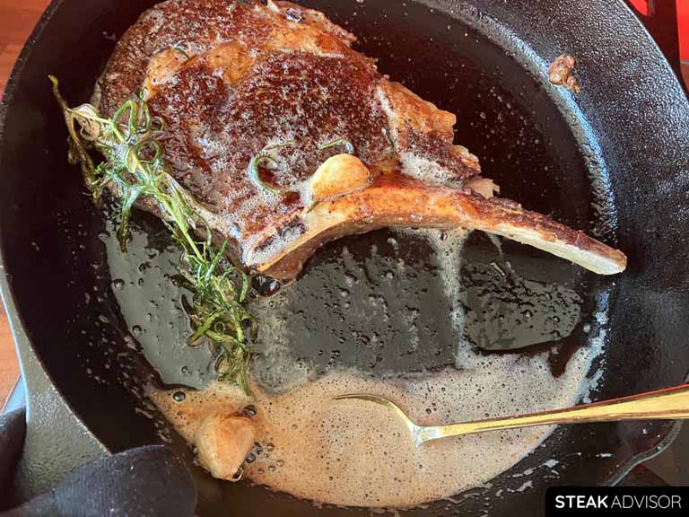 baste the cowboy steak with the melted butter