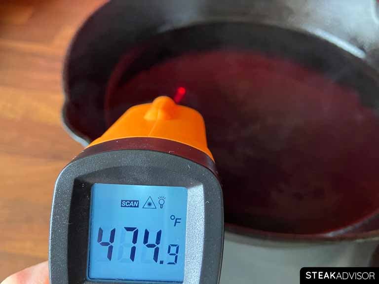 Cast iron skillet heated to 474°F (245°).