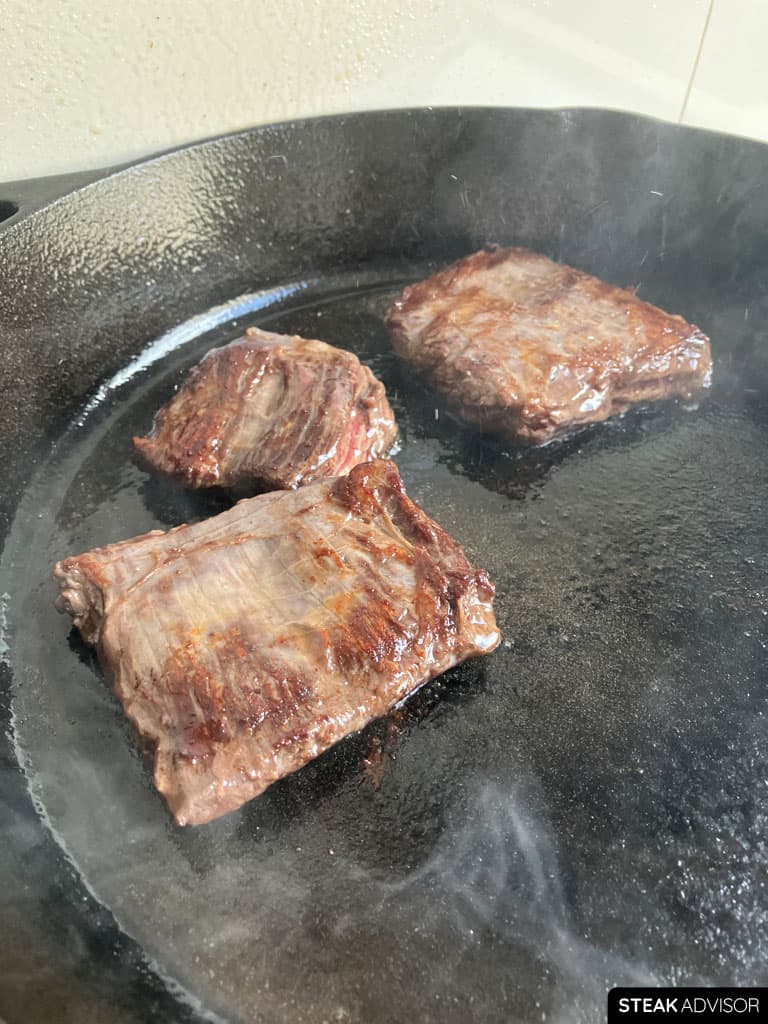 Pan-seared outside skirt steaks.