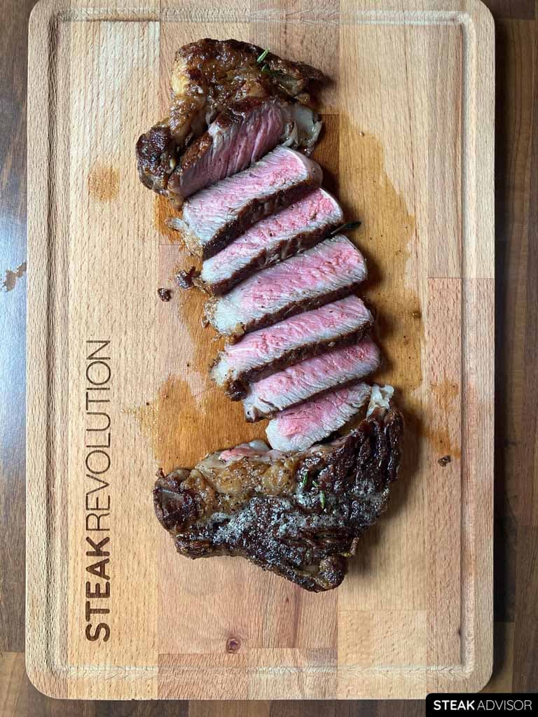 pan-seared ribeye steak; medium-rare doneness, vertical view