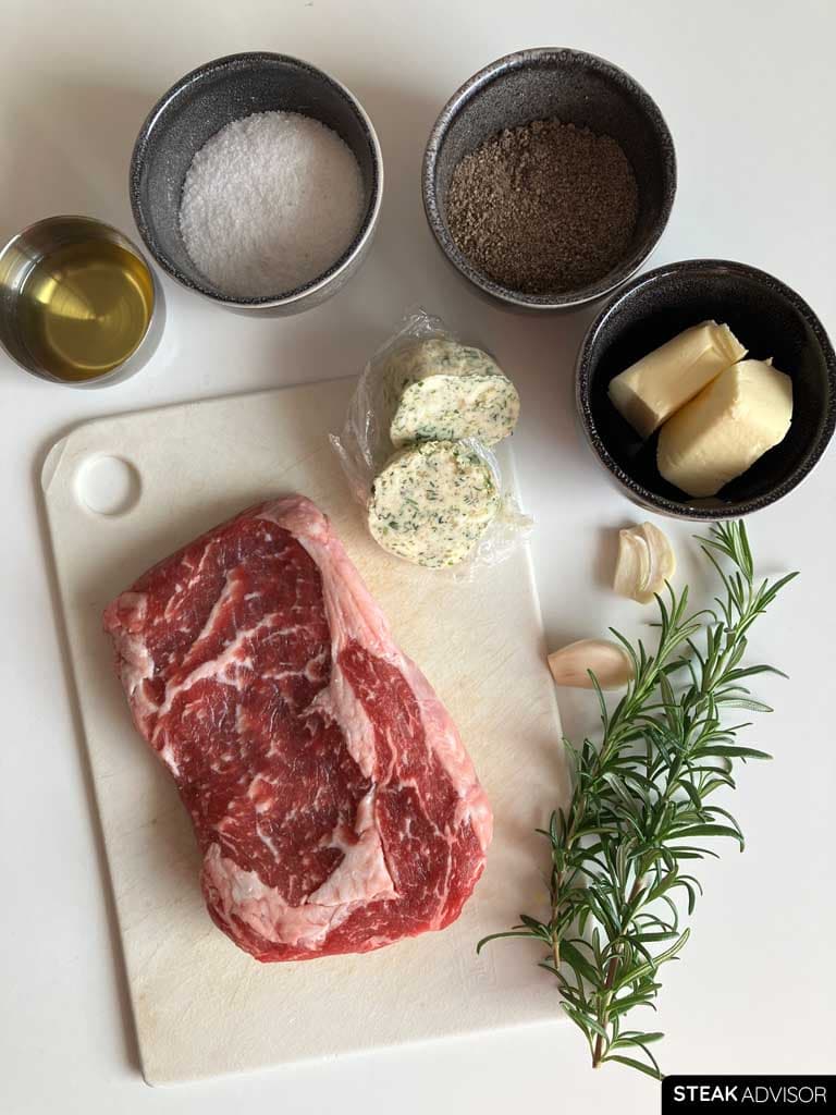 Ingredients for a pan-seared ribeye steak recipe, arranged vertically.