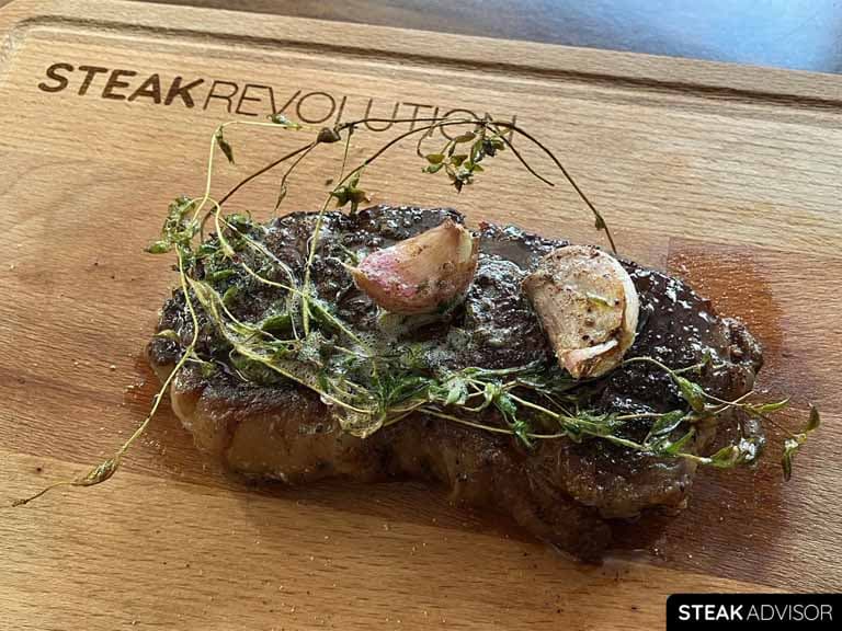 pan seared strip steak with garlic and thyme