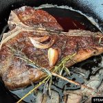Pan-seared t-bone steak; medium-rare doneness
