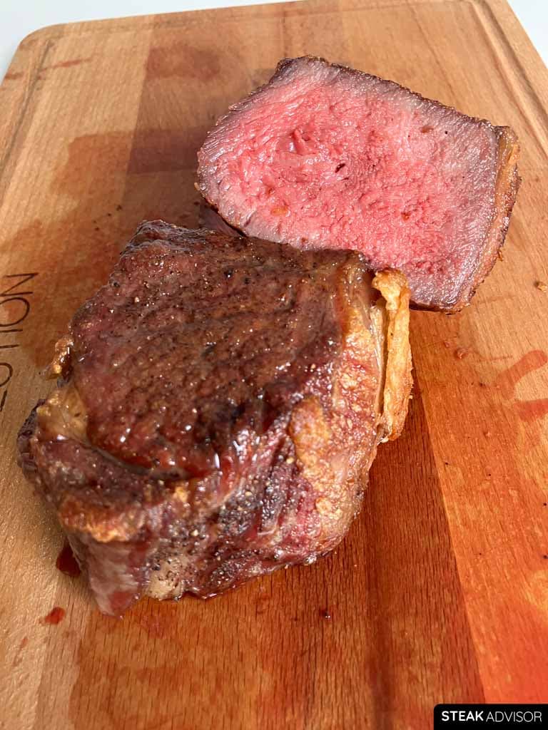 Reverse-seared dry-aged steak cooked to medium-rare.