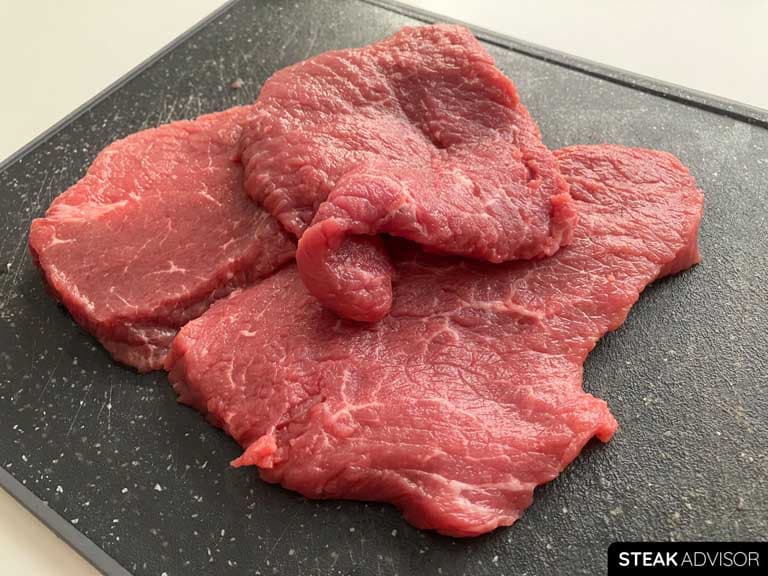 Thickness of raw sizzle steaks