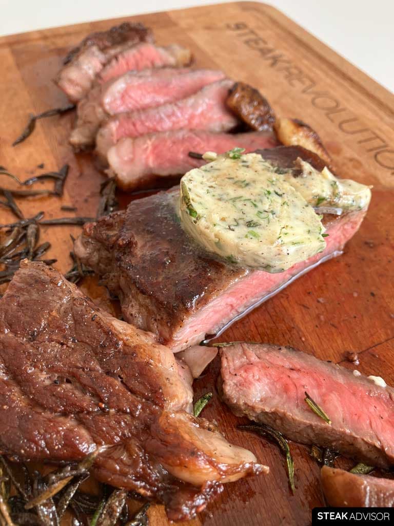 thin steak sliced on a cutting board