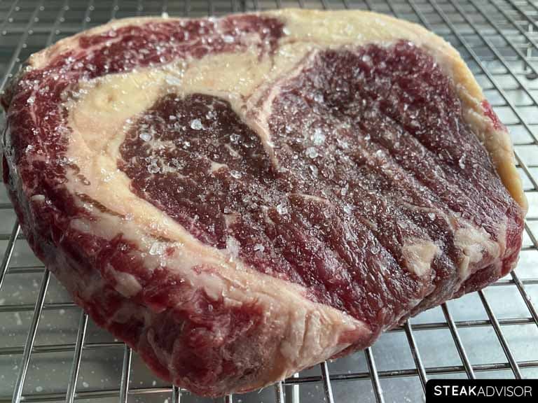 Very thin steak seasoned with kosher salt.