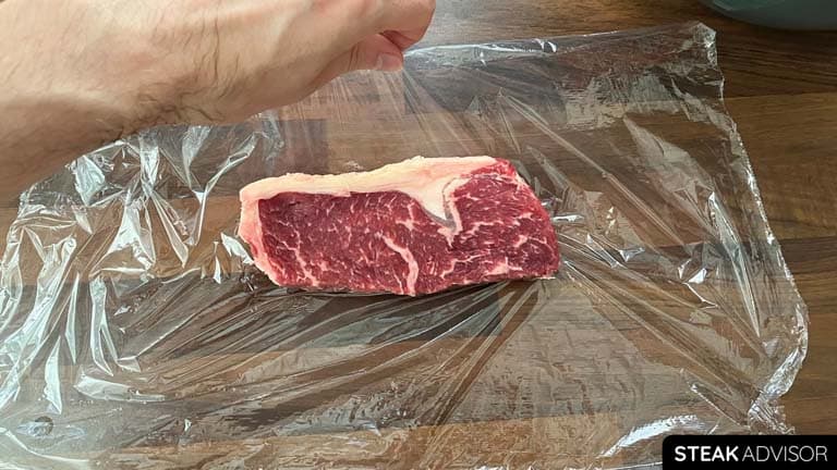 Step 1: wrapping strip steak in foil